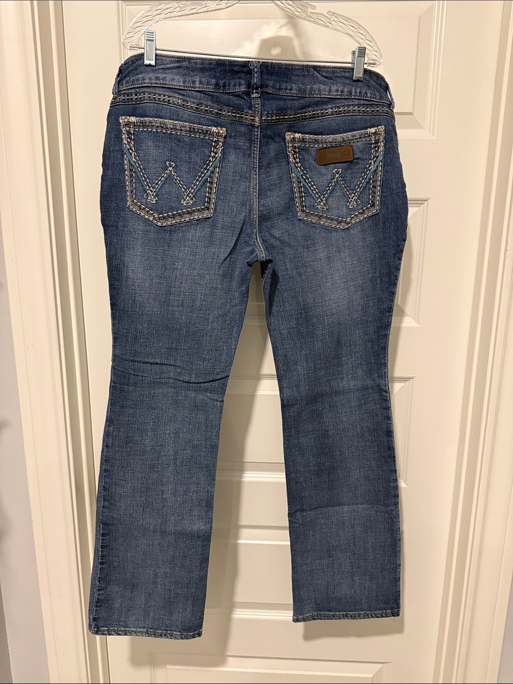 Dark Blue Bootcut Jeans with Embroidered Back Pockets
